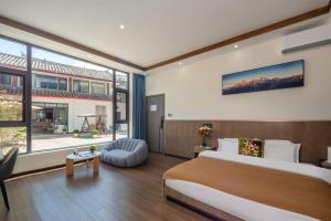 Fotografie z fotogalerie ubytování Nebula Retreat Snow Mountain View Bed and Breakfast v destinaci Li-ťiang