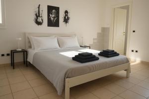 Ένα ή περισσότερα κρεβάτια σε δωμάτιο στο Idyllium Roma Suite +21 φωτογραφίες