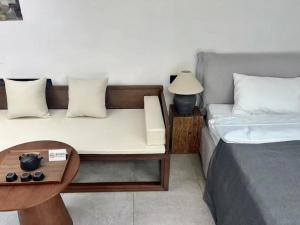 Χώρος καθιστικού στο Chenyuan Inn Near the Forbidden City Metro Convenient to go to the Great Wall