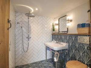 a bathroom with a sink and a shower at The Manor House in Marston Montgomery +37 photos