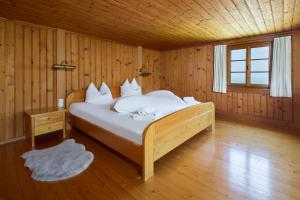Postel nebo postele na pokoji v ubytování Bauernhaus am Pfänderhang mit Seeblick