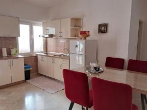 Kuchyň nebo kuchyňský kout v ubytování Apartments Melinda