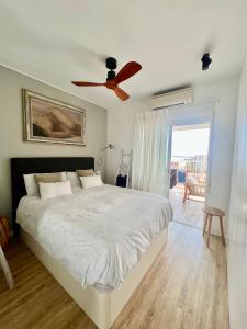 Posteľ alebo postele v izbe v ubytovaní Apartamento Deluxe Torremar