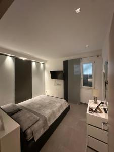 En eller flere senge i et værelse på Residenza Panama + 28 billeder