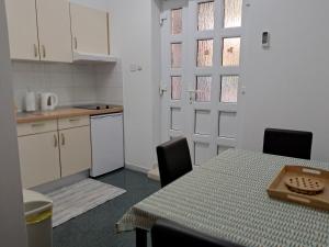 Kuchyň nebo kuchyňský kout v ubytování Apartments Melinda
