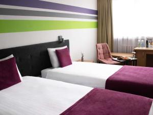 Postel nebo postele na pokoji v ubytování ibis Styles Bielsko Biala