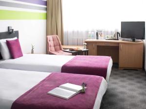 Postel nebo postele na pokoji v ubytování ibis Styles Bielsko Biala