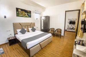 Evencia Resort客房内的一张或多张床位