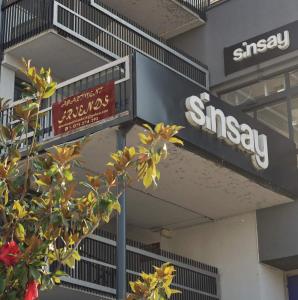 a sign on the side of a building at Apartment Friends in Veles