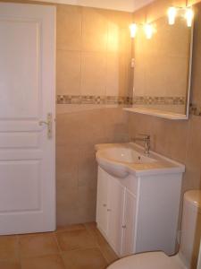 a bathroom with a sink and a toilet at E Stelle di A Bella Vista in Bonifacio