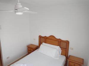 Postel nebo postele na pokoji v ubytování Perla III Solo Familias Serviplaya + 25 fotografií