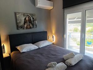 Postel nebo postele na pokoji v ubytování Sountou home