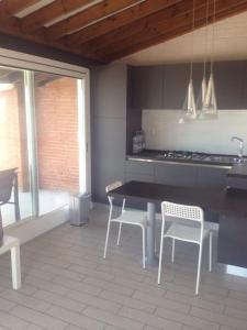 Η κουζίνα ή μικρή κουζίνα στο Villa Twins Ansedonia