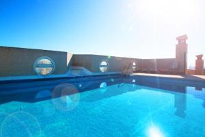 a large swimming pool on top of a building at Expoholidays - Galeon 46 Puerto Deportivo in El Ejido