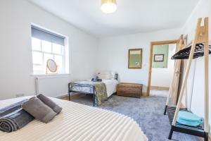 Postel nebo postele na pokoji v ubytování Manchester Retreat, Free Parking & Sleeps 5
