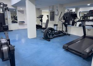 a gym with several treadmills and exercise bikes at Holiday Club Puerto Calma in Puerto Rico de Gran Canaria