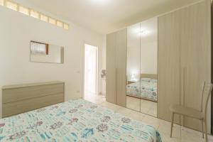 Postel nebo postele na pokoji v ubytování Appartamenti Le Miniere 2 e 3 - Goelba