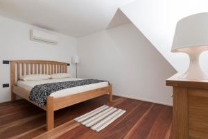 Postel nebo postele na pokoji v ubytování Villa ao Mar