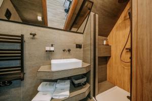 a bathroom with a sink and a shower at Willa Bachledzki Wierch 12 in Zakopane +43 photos