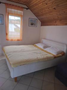 Postel nebo postele na pokoji v ubytování Apartman Dane + 7 fotografií