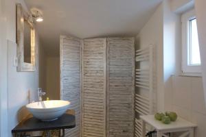 Ein Badezimmer in der Unterkunft Kamminke - Uns lütt Hus