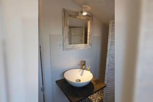 Ein Badezimmer in der Unterkunft Kamminke - Uns lütt Hus
