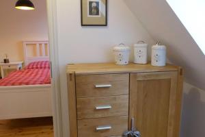 Ein Bett oder Betten in einem Zimmer der Unterkunft Kamminke - Uns lütt Hus