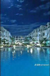 a view of a resort at night at Mansouria beach resort in Mohammedia