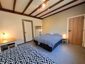 Gîte de Groupe de la Semoisにあるベッド