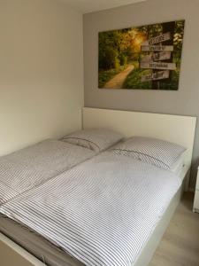 Ένα ή περισσότερα κρεβάτια σε δωμάτιο στο Westside-Apartment Aalen