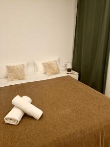 Posteľ alebo postele v izbe v ubytovaní Hostal Balkonis