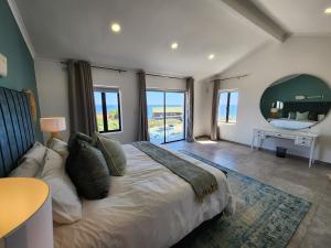 Postel nebo postele na pokoji v ubytování House Déjá View Seaside Holiday home