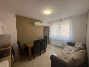Posedenie v ubytovaní Kohl Wellness Apartman