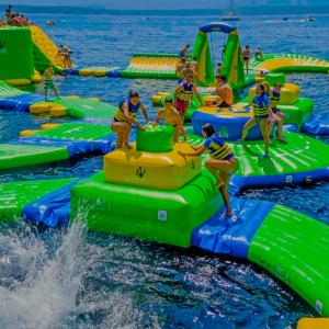 a group of people on a water park at Villa Leggiero in Fažana