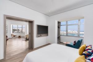 Un ou plusieurs lits dans un hébergement de l'établissement Marina Bay City Center