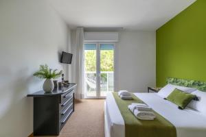 TV a/nebo společenská místnost v ubytování Harvey Suites Hotel & Residence