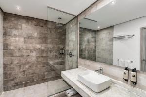 Salle de bains dans l'établissement Marina Bay City Center
