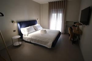Postel nebo postele na pokoji v ubytování Maison Miris