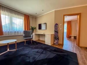 TV a/nebo společenská místnost v ubytování zum Senner Suites Zillertal
