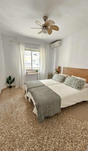 Postel nebo postele na pokoji v ubytování Apartamento albaida 3g