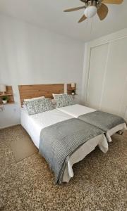 Postel nebo postele na pokoji v ubytování Apartamento albaida 3g + 4 fotografie