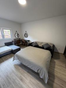 Postel nebo postele na pokoji v ubytování Apartmán Koupálo Janovičky