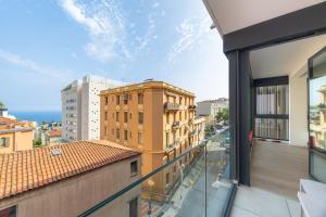 a view from the balcony of a building at Luxury 3BR Apartment with Sea View in Beausoleil