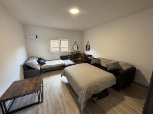 Postel nebo postele na pokoji v ubytování Apartmán Koupálo Janovičky
