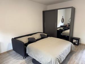 Postel nebo postele na pokoji v ubytování Apartmán Koupálo Janovičky