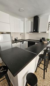 Kuchyň nebo kuchyňský kout v ubytování Apartamento albaida 3g