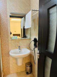 Koupelna v ubytování Hotel Argo