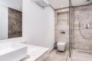Salle de bains dans l'établissement Marina Bay City Center