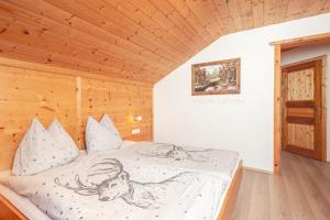 Posteľ alebo postele v izbe v ubytovaní Wilderer Alm Chalet Katschberg