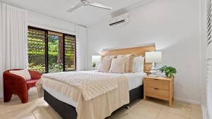 Letto o letti in una camera di The Pavilion at Trinity Beach